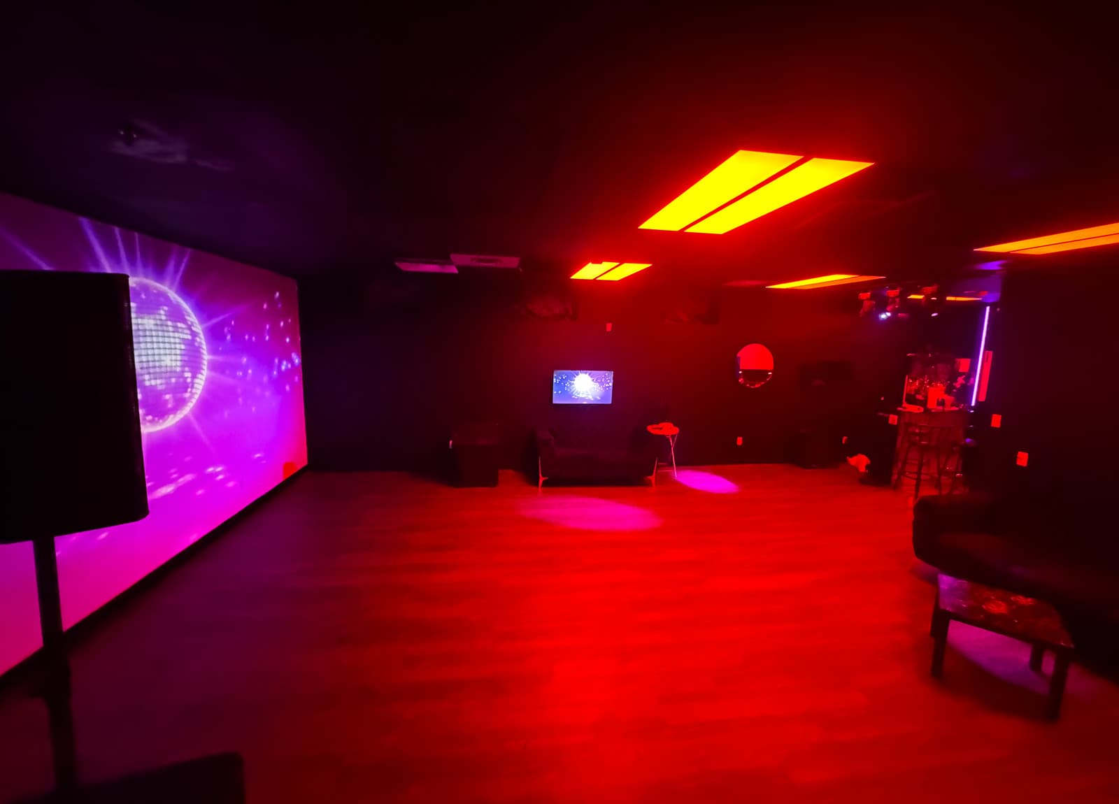 Empty dance floor under red wash